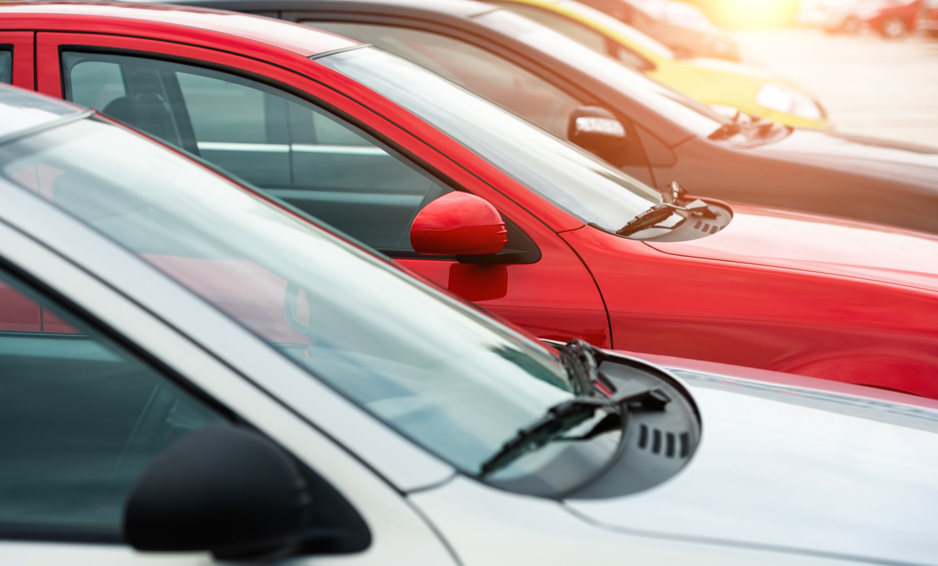 Side view of a range of used modern vehicles